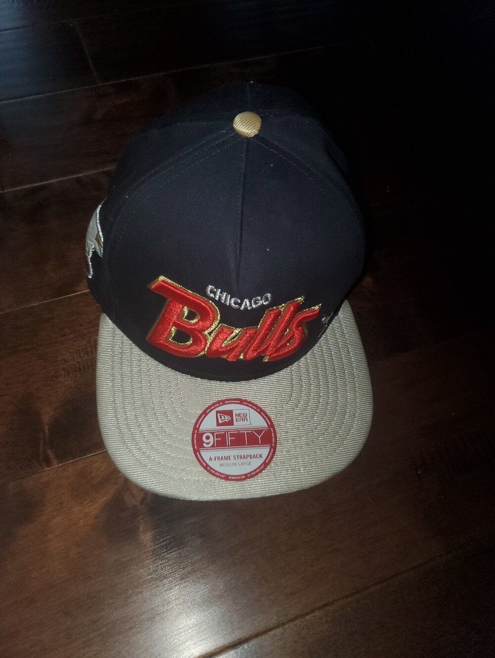New Era Chicago Bulls Black and Gray Snapback Hat with Red Gold Logo
